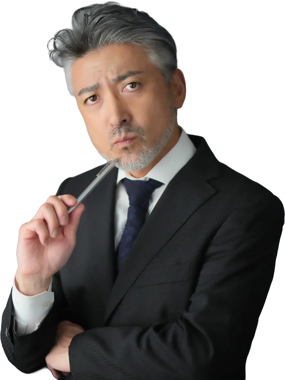 考えている経営者の画像